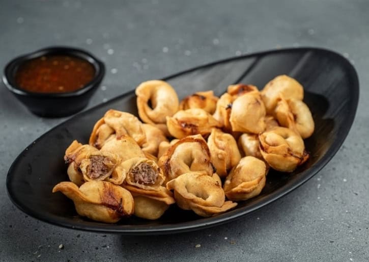 דושפרה כיסונים בוכרים במילוי בשר משובח עשיר בטעמים במארז קפוא